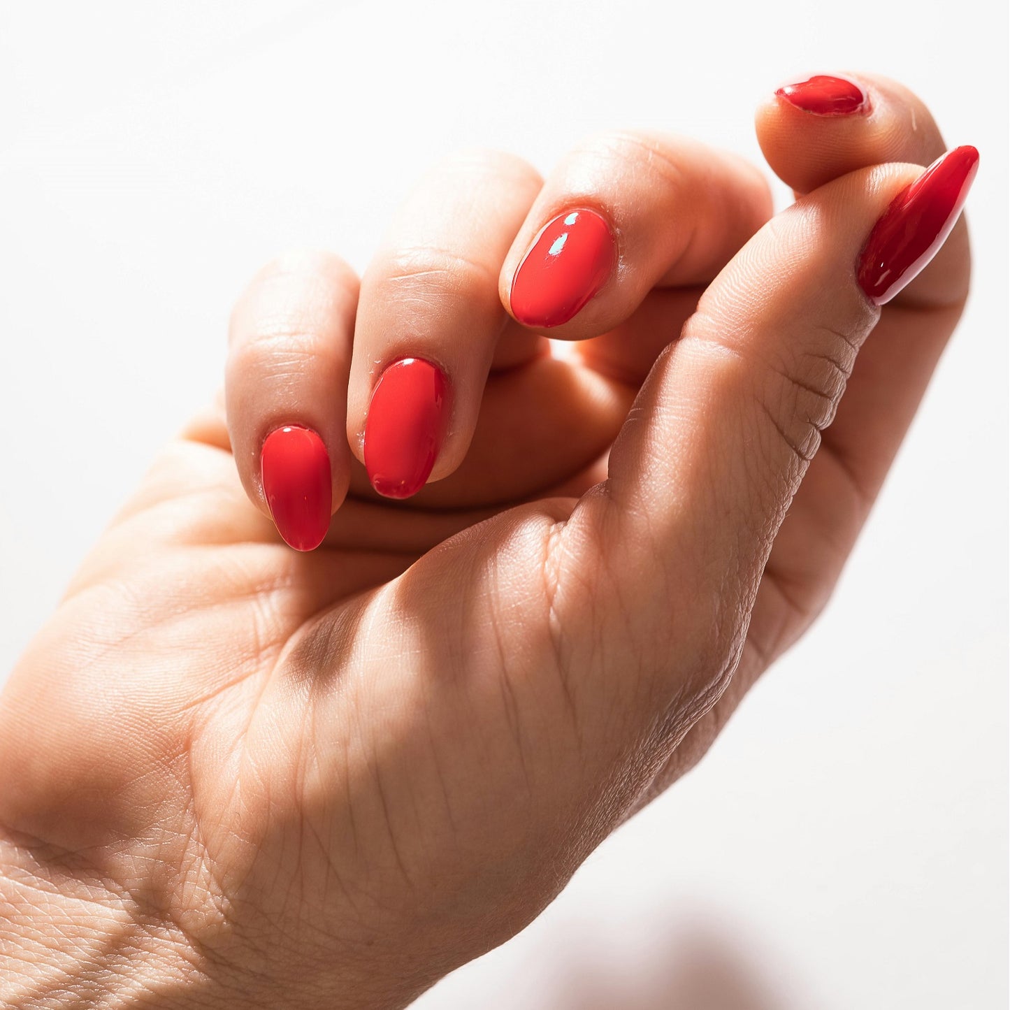 Nails at home women with red gel nails after a manicure. Hastings and saint Leonards nail technician